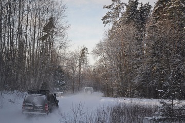 Winter forest driving Baltic Run snowy adventure